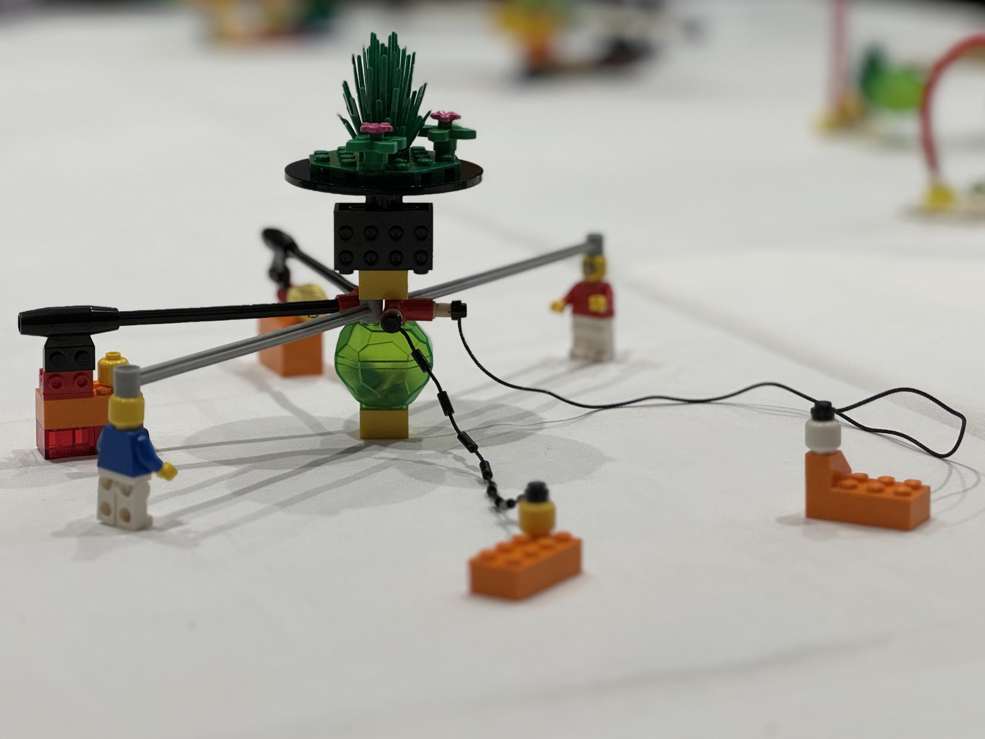 LEGO model of a scientific experiment setup on a white surface
